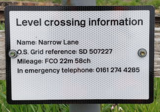 An example of a level crossing plate